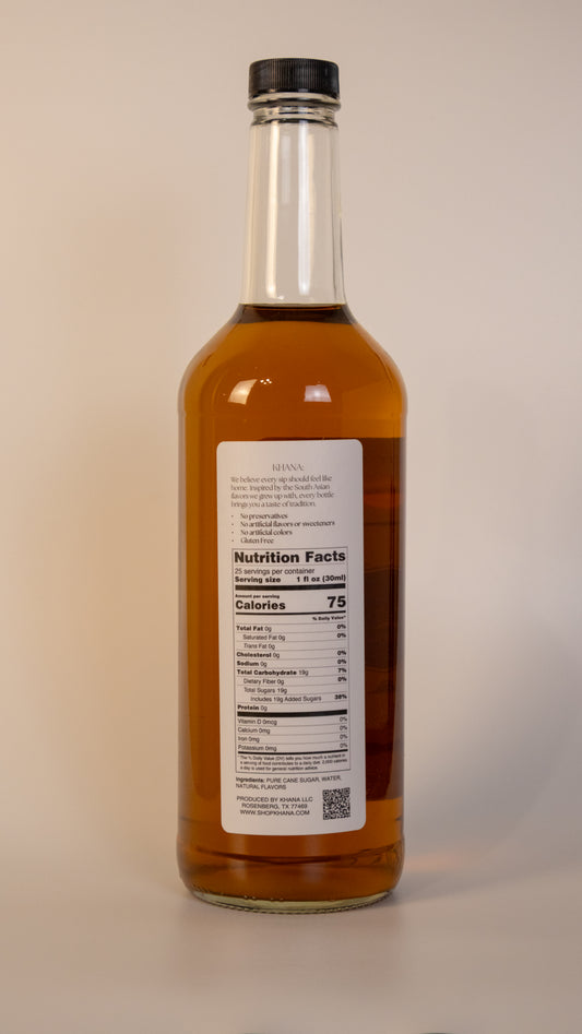 Khana Chait Syrup 750mL nutrition label and ingredients. 25 servings per container. 1oz serving size. 75 calories and 19g of sugar per serving. All natural, no artificial dyes, sweeteners, or flavors of any kind.