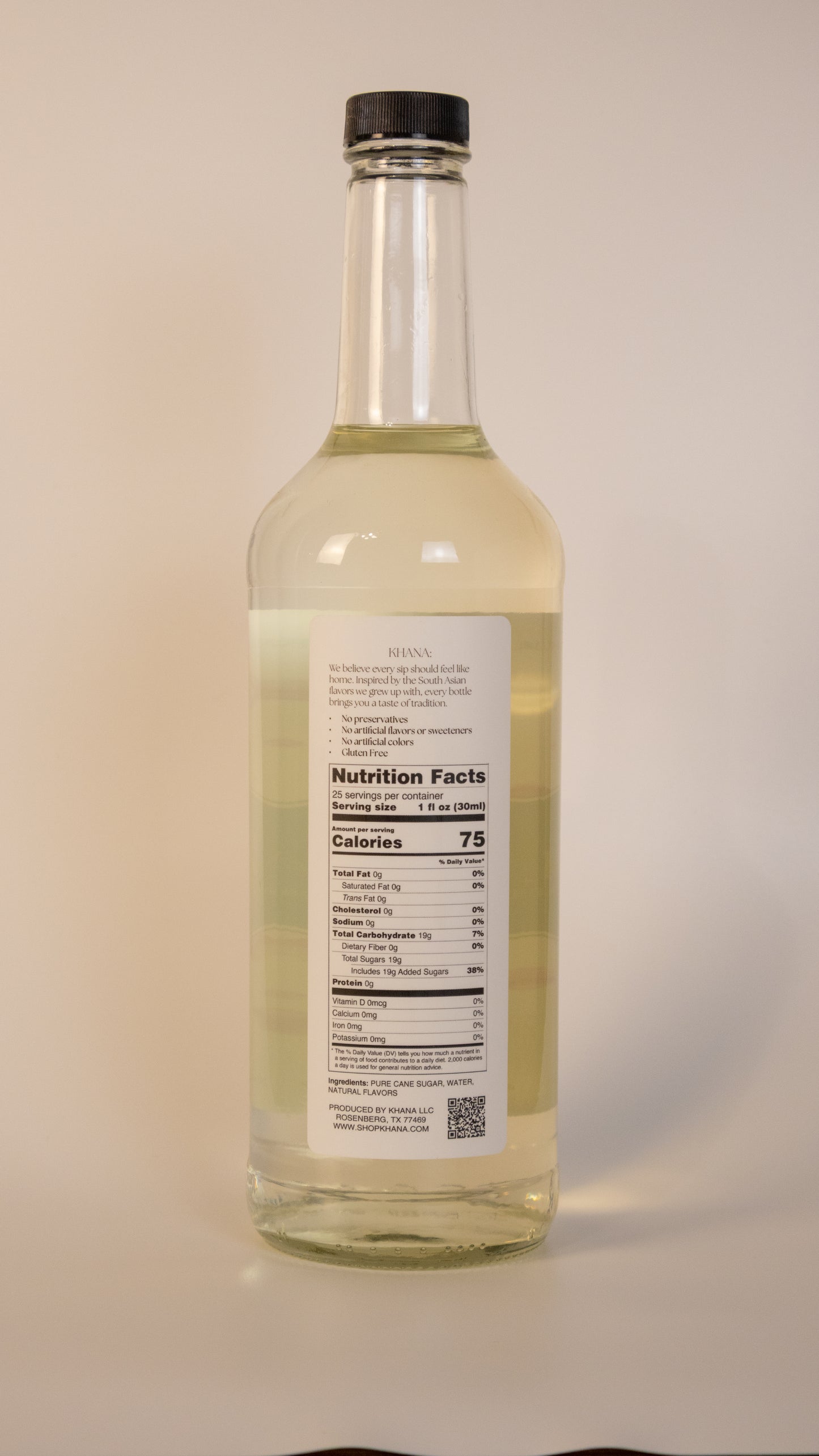 Khana Rose Syrup 750mL nutrition label and ingredients. 25 servings per container. 1oz serving size. 75 calories and 19g of sugar per serving. All natural, no artificial dyes, sweeteners, or flavors of any kind.