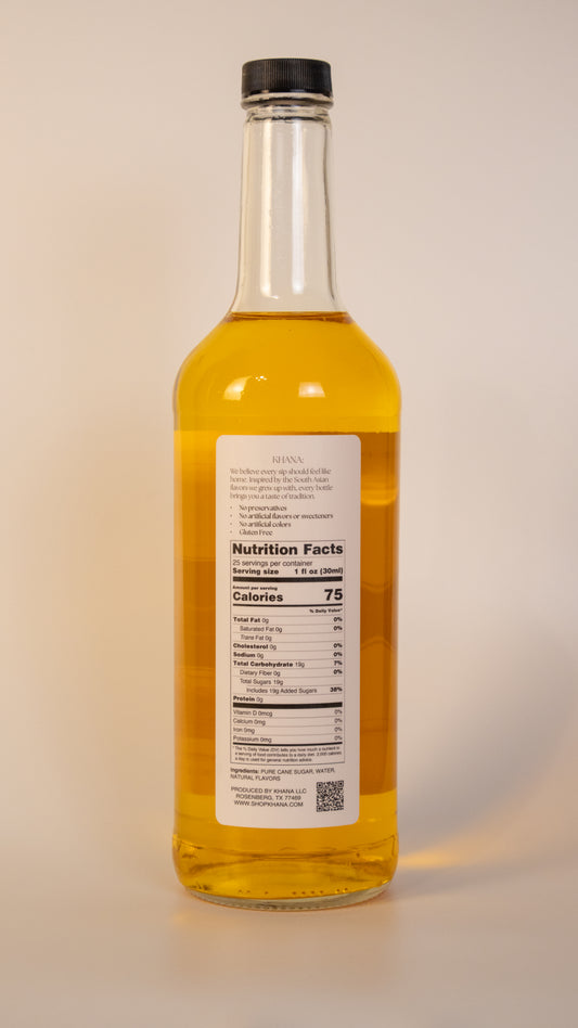 Khana Saffron Syrup 750mL nutrition label and ingredients. 25 servings per container. 1oz serving size. 75 calories and 19g of sugar per serving. All natural, no artificial dyes, sweeteners, or flavors of any kind.