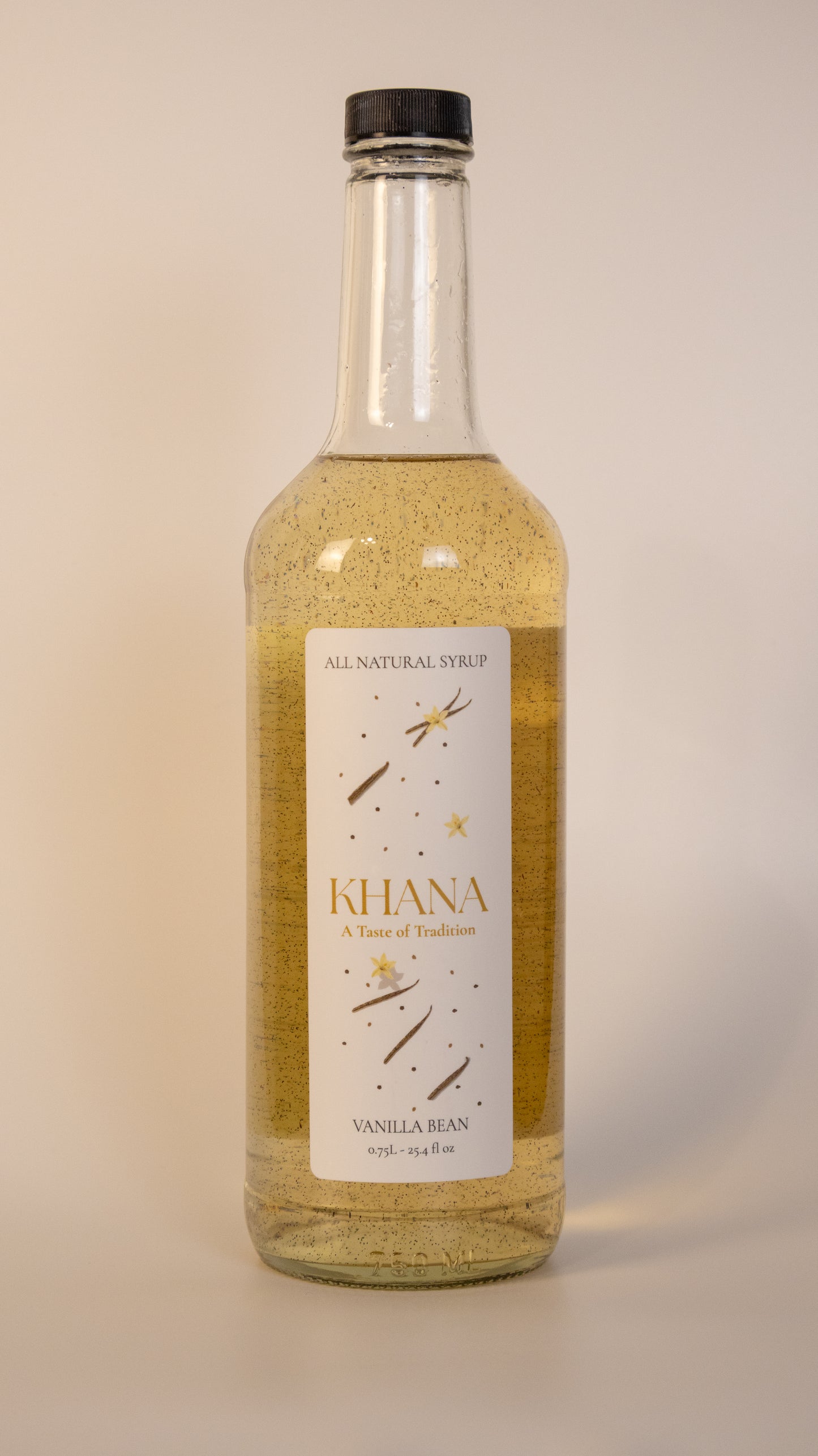 750mL glass bottle of Khana All Natural Vanilla Bean Syrup.