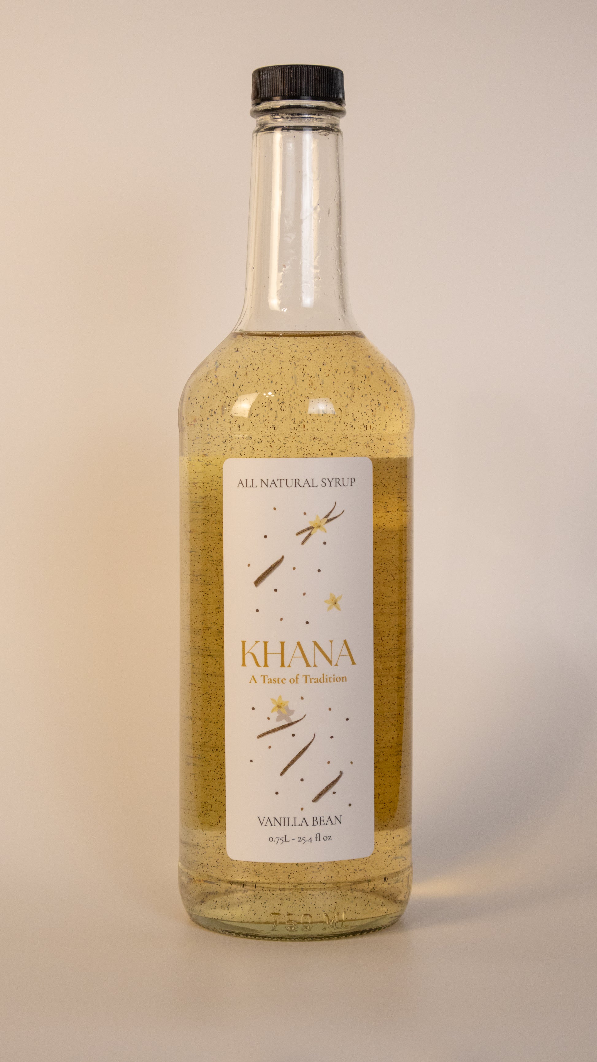 750mL glass bottle of Khana All Natural Vanilla Bean Syrup.