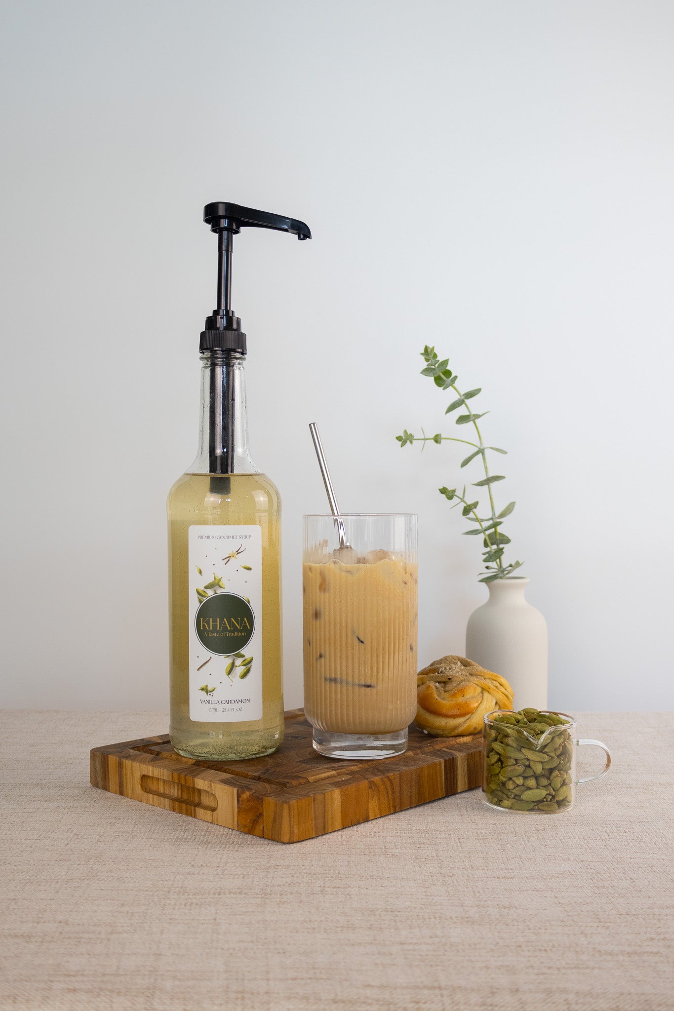 Khana Vanilla Cardamom Syrup lifestyle shot - South Asian-inspired all-natural coffee syrup