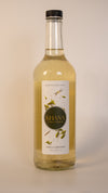 Khana Vanilla Cardamom Syrup - 750mL glass bottle. All natural South Asian-inspired syrup for coffee, matcha, and more. No artificial dyes, sweeteners, or flavors of any kind.